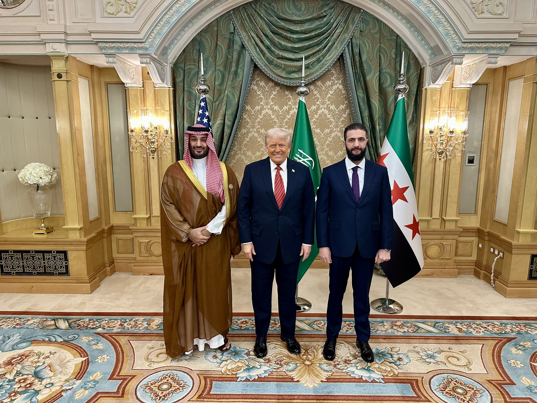 president_donald_trump_with_saudi_crown_prince_mohammed_bin_salman_and_president_of_syria_ahmed_al-sharaa_2025.jpg